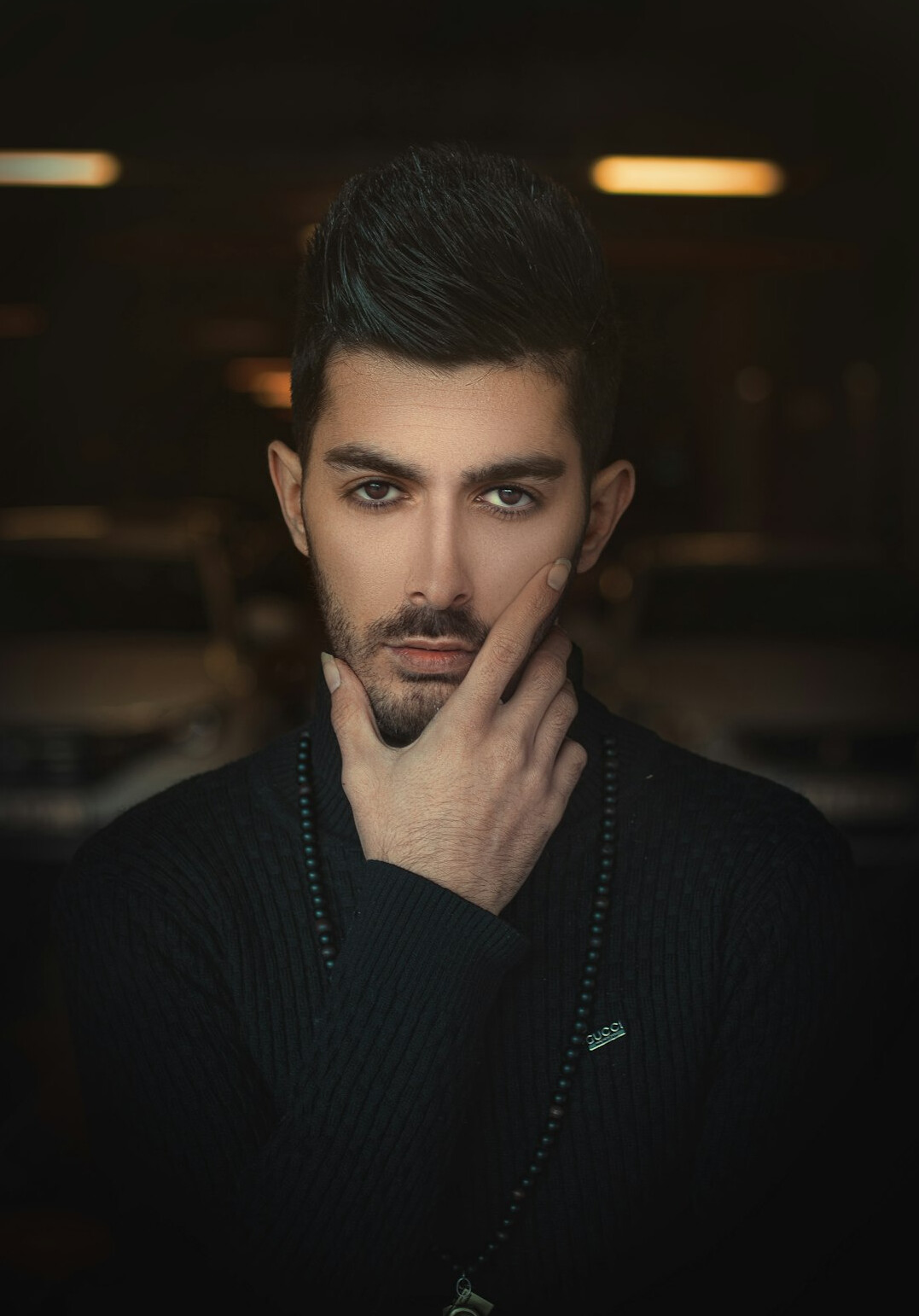 Studio portrait of a Turkish male chief editor in his 40s wearing a shirt and blazer
